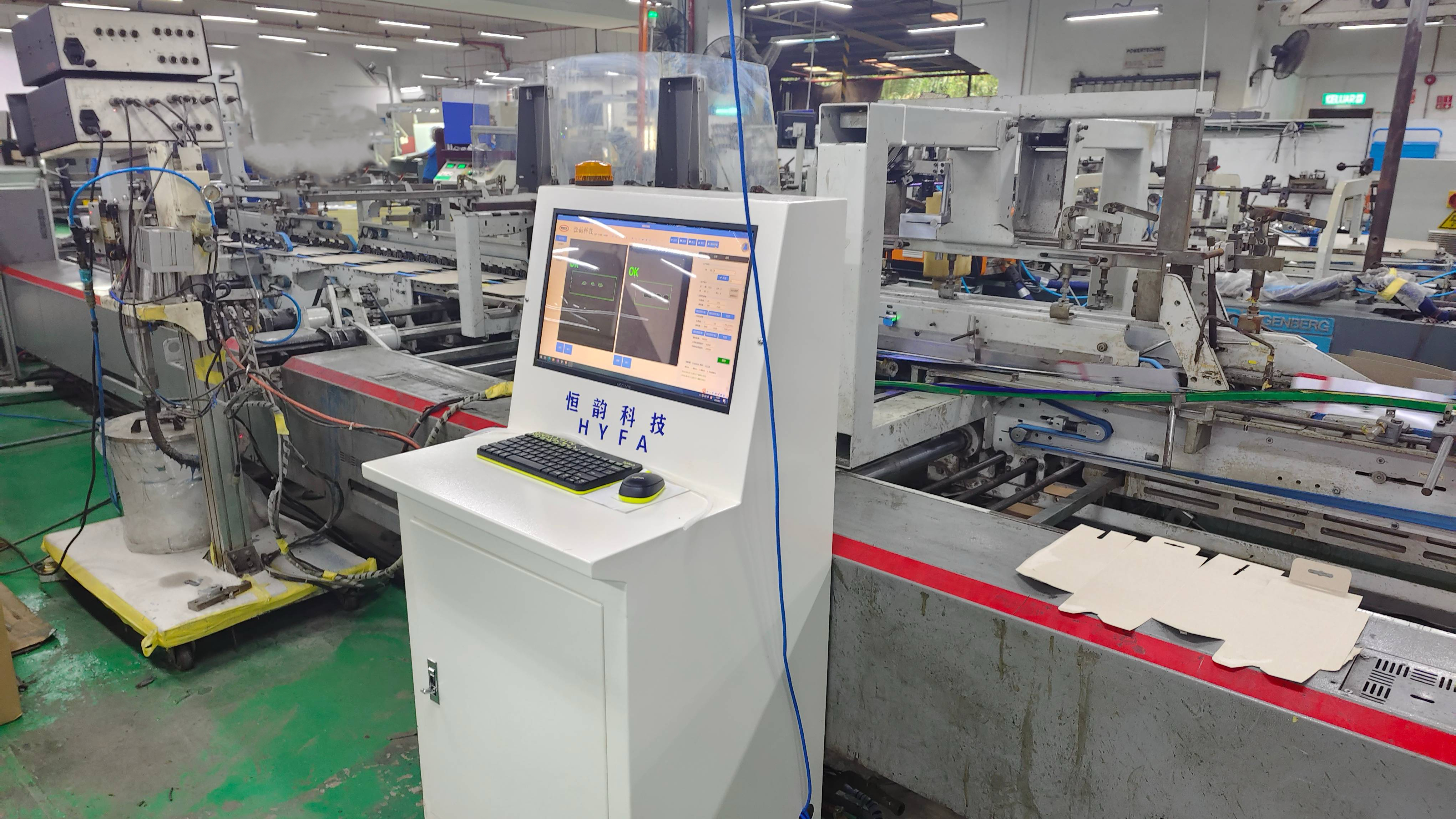 Folder gluer spraying online detection equipment